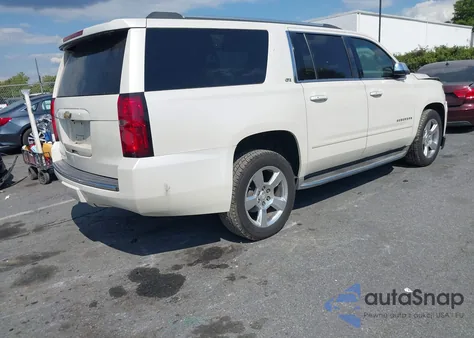 2015 Chevrolet Suburban 1500 Ltz z USA, uszkodzony, nr VIN 1GNSCKKC2FR548984